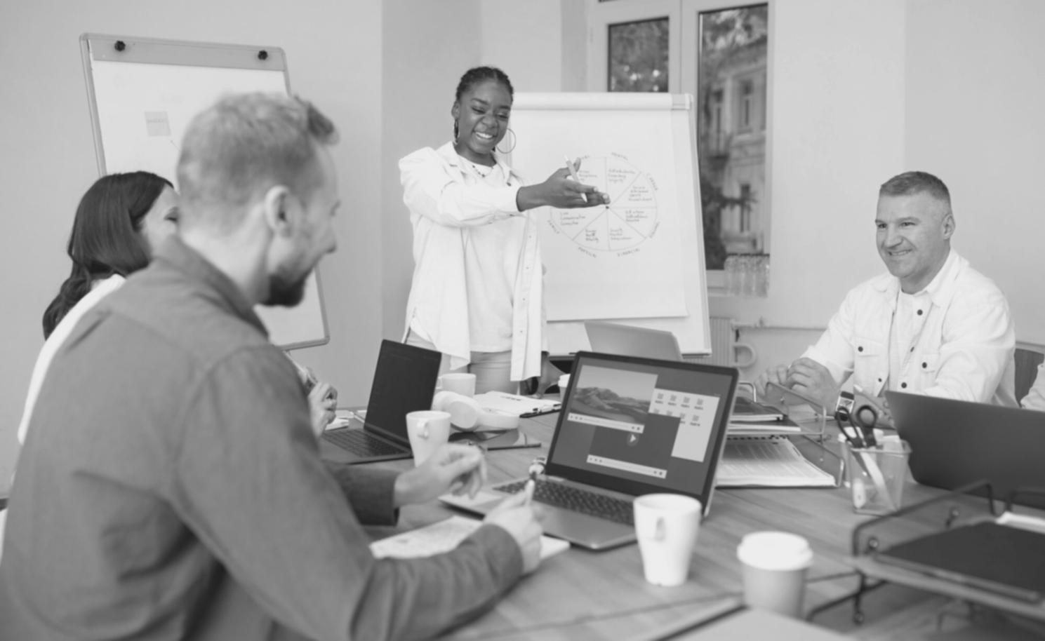 Financial planning workshop session with participants reviewing budget documents